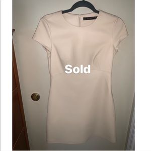 Leather cap sleeve dress.